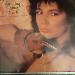 Running Up That Hill Vinyl Record Kate Bush 45 single with picture sleeve.